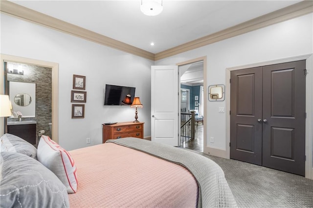 3075 Woodvale Ct, Alpharetta, GA 30022 - carpeted bedroom featuring crown molding, a closet, baseboards, and connected bathroom