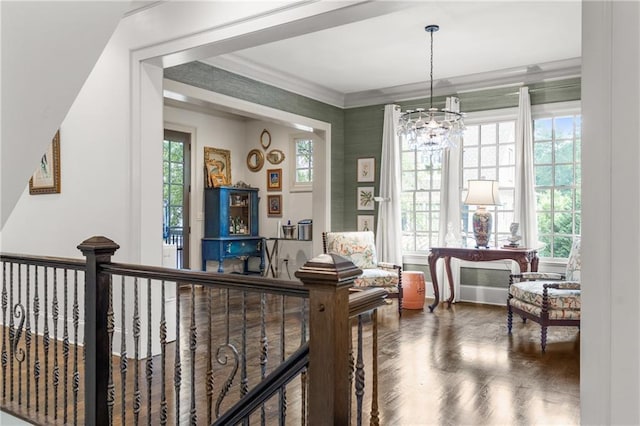 3075 Woodvale Ct, Alpharetta, GA 30022 - living area with a chandelier, crown molding, and wood finished floors