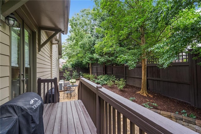 3075 Woodvale Ct, Alpharetta, GA 30022 - wooden deck with a fenced backyard and a grill