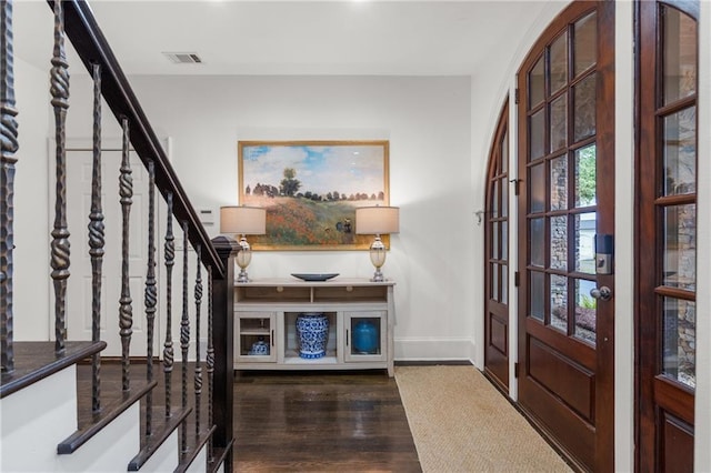 3075 Woodvale Ct, Alpharetta, GA 30022 - entrance foyer with baseboards, stairs, and wood finished floors