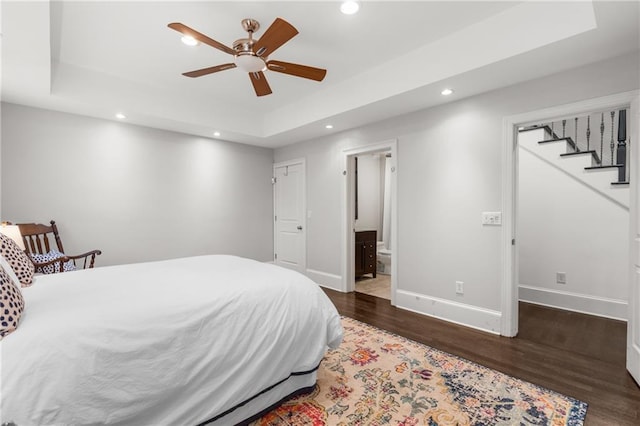 3075 Woodvale Ct, Alpharetta, GA 30022 - bedroom with recessed lighting, a raised ceiling, wood finished floors, baseboards, and ensuite bathroom