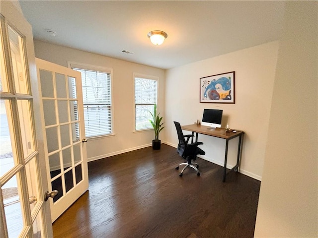 office space with dark wood-type flooring and french doors