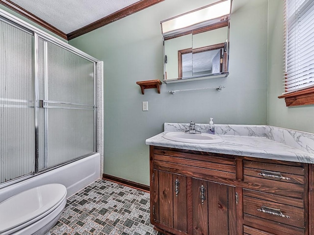 full bathroom with bath / shower combo with glass door, vanity, ornamental molding, a textured ceiling, and toilet