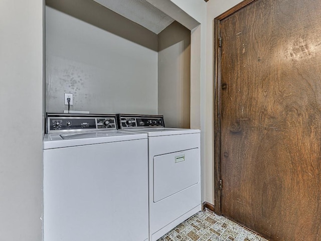 laundry area featuring washing machine and dryer