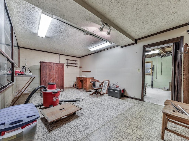 miscellaneous room with a textured ceiling