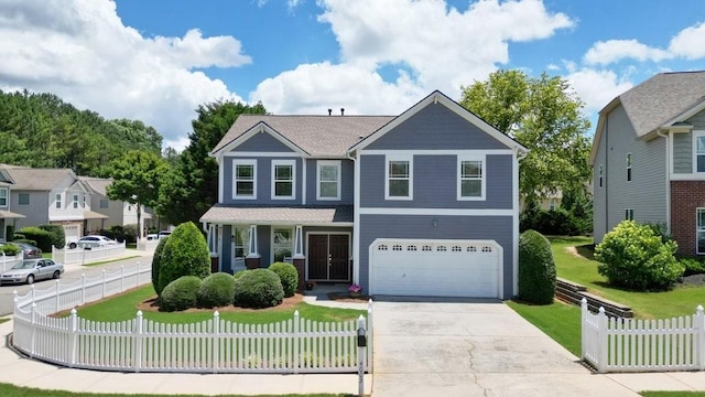 4003 Coachman Ct, Cumming, GA 30040 - traditional home featuring a garage, driveway, and a fenced front yard