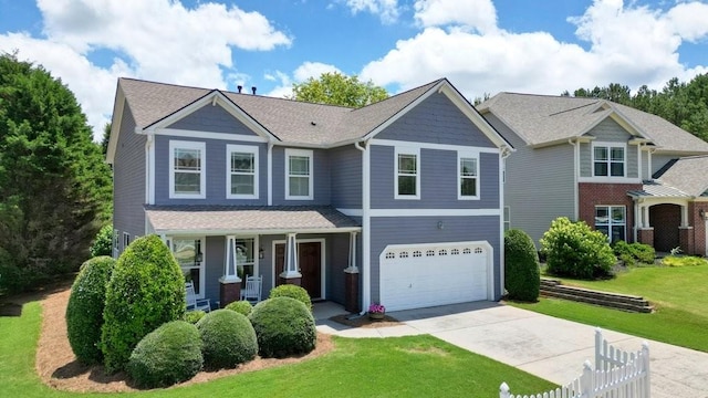 4003 Coachman Ct, Cumming, GA 30040 - craftsman-style home featuring covered porch, concrete driveway, an attached garage, and a front yard