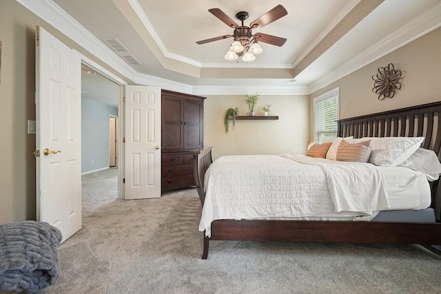 4003 Coachman Ct, Cumming, GA 30040 - bedroom featuring light carpet, ornamental molding, a tray ceiling, and ceiling fan