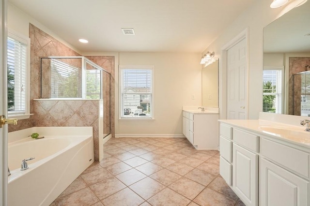 4003 Coachman Ct, Cumming, GA 30040 - bathroom with a shower stall, two vanities, a bath, and tile patterned floors