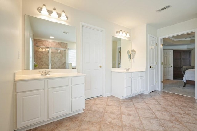 4003 Coachman Ct, Cumming, GA 30040 - ensuite bathroom featuring a stall shower and two vanities