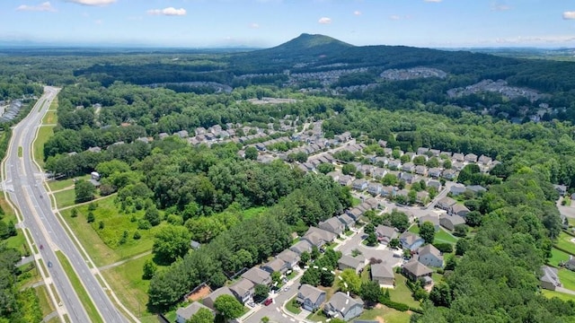 4003 Coachman Ct, Cumming, GA 30040 - aerial view of residential area featuring a heavily wooded area and a major roadway