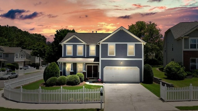 4003 Coachman Ct, Cumming, GA 30040 - view of front of home with a garage, driveway, and a fenced front yard