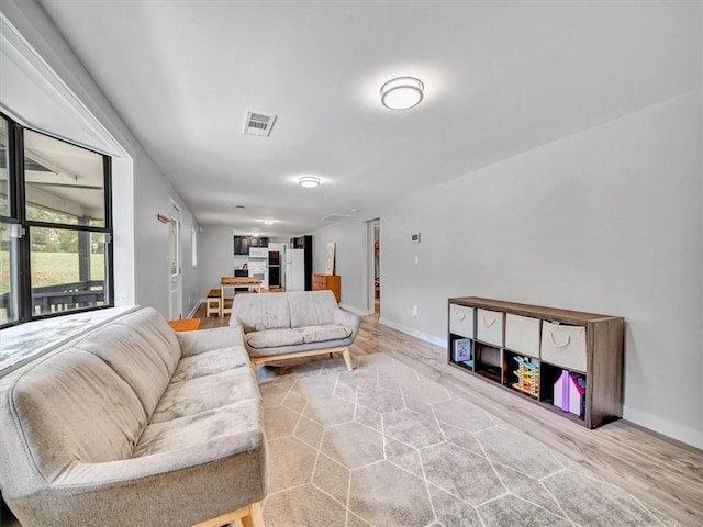 living room with hardwood / wood-style flooring