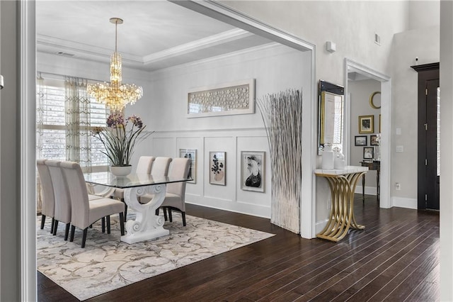 1250 Atherton Park, Roswell, GA 30076 - dining room with a chandelier, healthy amount of natural light, dark wood-style flooring, ornamental molding, and a decorative wall