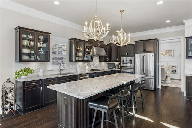 1250 Atherton Park, Roswell, GA 30076 - kitchen featuring stainless steel appliances, a sink, a chandelier, under cabinet range hood, and dark wood finished floors