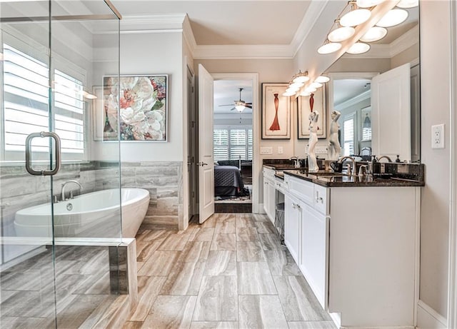 1250 Atherton Park, Roswell, GA 30076 - ensuite bathroom featuring vanity, healthy amount of natural light, a freestanding bath, ornamental molding, and a ceiling fan