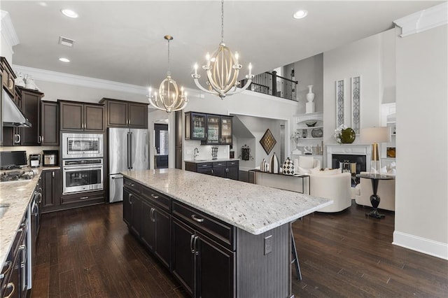 1250 Atherton Park, Roswell, GA 30076 - kitchen with appliances with stainless steel finishes, a chandelier, a center island, dark wood-style floors, and recessed lighting