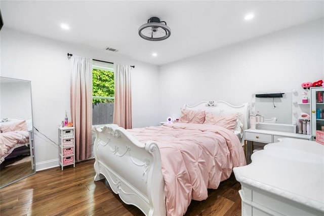 bedroom with visible vents, recessed lighting, baseboards, and dark wood-type flooring