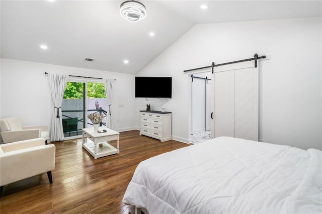 bedroom with visible vents, vaulted ceiling, a barn door, dark wood-style floors, and recessed lighting