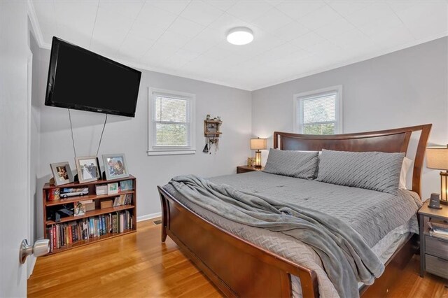 bedroom featuring ornamental molding