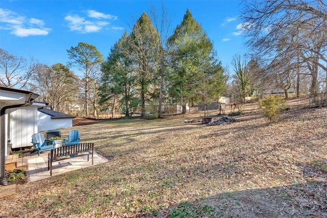 view of yard with a patio area and fence