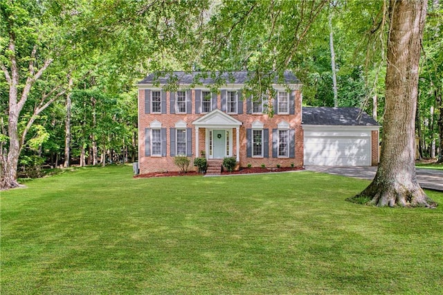 4635 Walden Trce, Peachtree Corners, GA 30092 - colonial inspired home with brick siding, an attached garage, a front yard, and concrete driveway