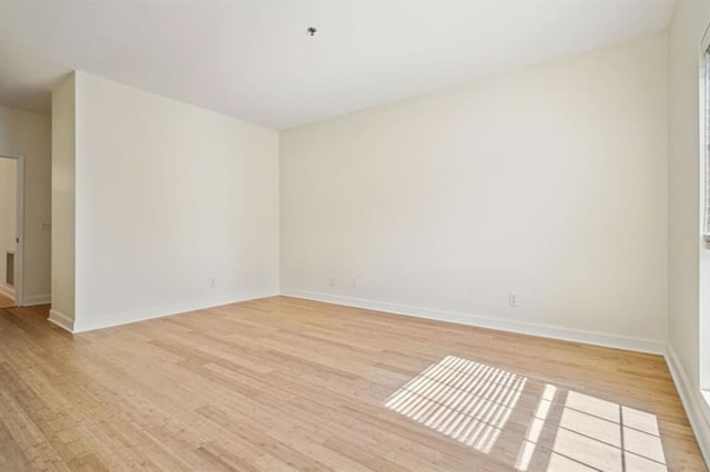 2921 Lenox Rd Unit 308, Atlanta, GA 30324 - empty room featuring light wood finished floors and baseboards