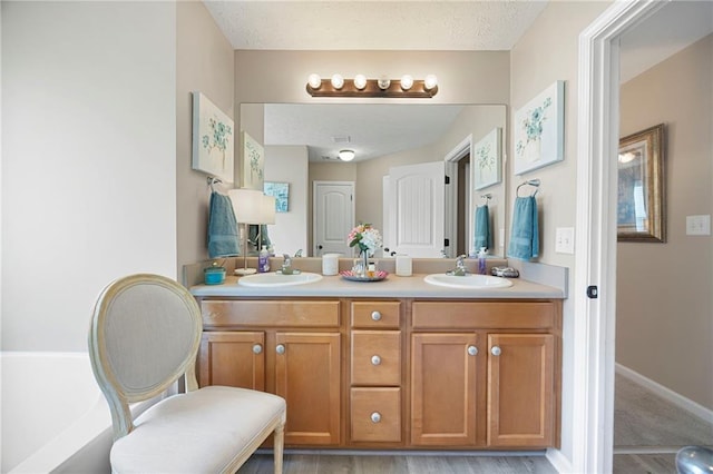 102 Autumn Brooke Trl, Dallas, GA 30157 - full bathroom with double vanity and baseboards