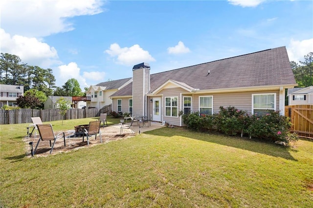 102 Autumn Brooke Trl, Dallas, GA 30157 - back of property with an outdoor fire pit, a patio, a chimney, and a shingled roof