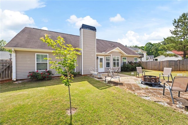 102 Autumn Brooke Trl, Dallas, GA 30157 - rear view of house featuring an outdoor fire pit, a patio area, and a chimney
