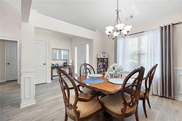 102 Autumn Brooke Trl, Dallas, GA 30157 - dining room featuring a chandelier, light wood-style floors, and crown molding
