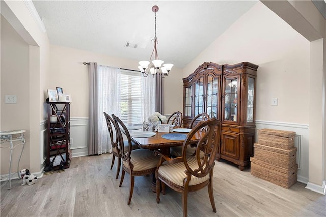 102 Autumn Brooke Trl, Dallas, GA 30157 - dining room with a chandelier, light wood-style floors, and vaulted ceiling
