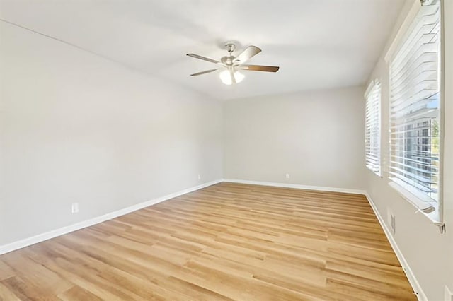 unfurnished room featuring ceiling fan and light hardwood / wood-style floors