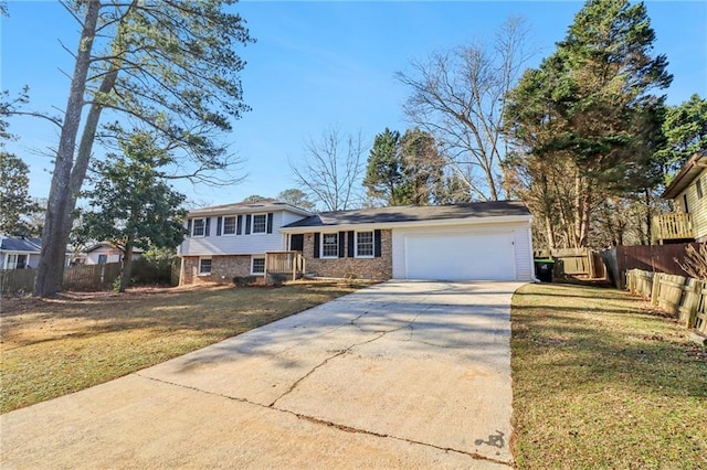 view of front facade featuring a garage and a front lawn