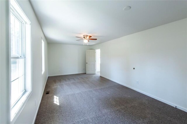 unfurnished bedroom with a closet and dark wood-type flooring