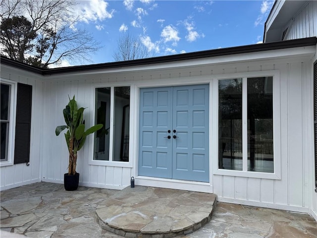 entrance to property with a patio and french doors