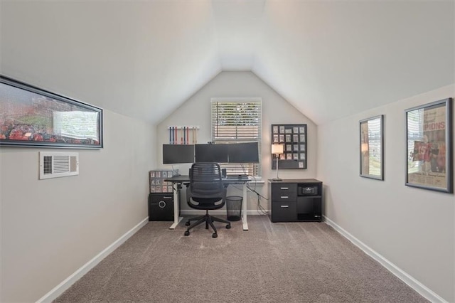 office area with lofted ceiling, carpet flooring, and baseboards