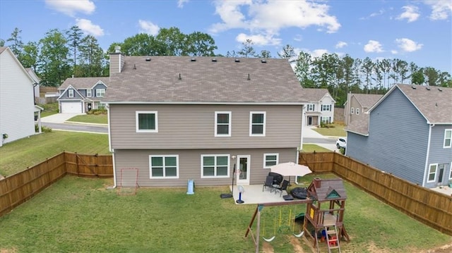 back of property featuring a patio area, a playground, a chimney, and a residential view