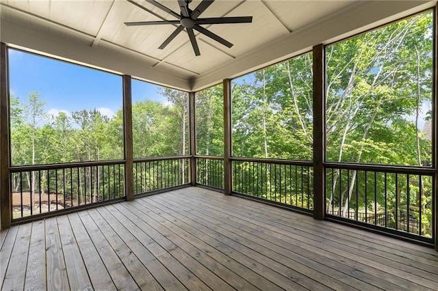 4860 Grandview Ct, Flowery Branch, GA 30542 - unfurnished sunroom with ceiling fan and view of wooded area