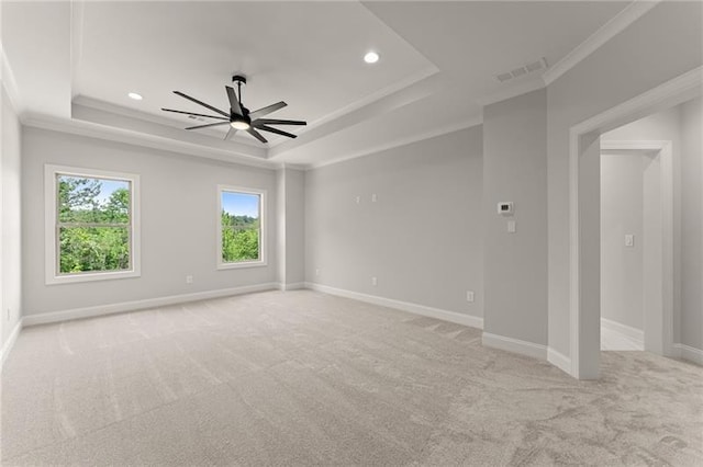 4860 Grandview Ct, Flowery Branch, GA 30542 - spare room with a tray ceiling, light colored carpet, ceiling fan, recessed lighting, and ornamental molding