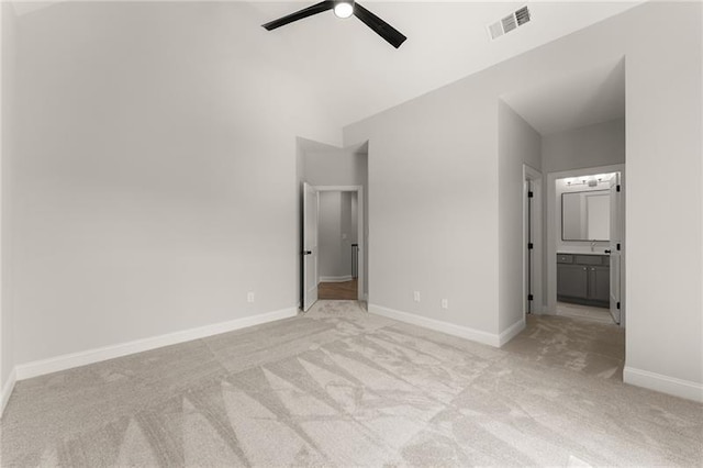 4860 Grandview Ct, Flowery Branch, GA 30542 - unfurnished bedroom with light colored carpet, connected bathroom, and a ceiling fan