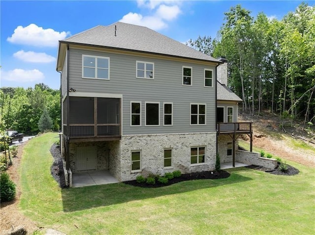 4860 Grandview Ct, Flowery Branch, GA 30542 - rear view of property featuring a chimney, a lawn, a sunroom, and a patio