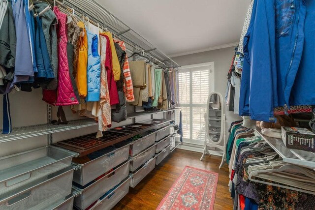 spacious closet with wood finished floors