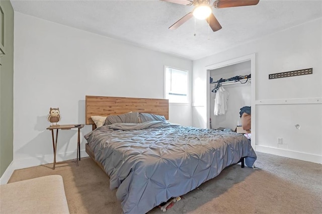 bedroom with ceiling fan, a closet, and carpet floors