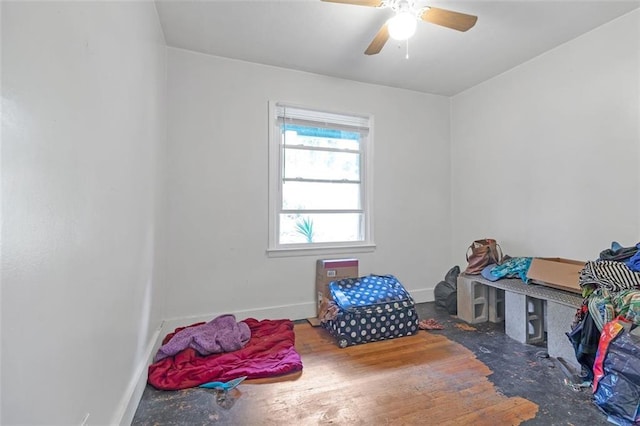 recreation room featuring hardwood / wood-style floors and ceiling fan