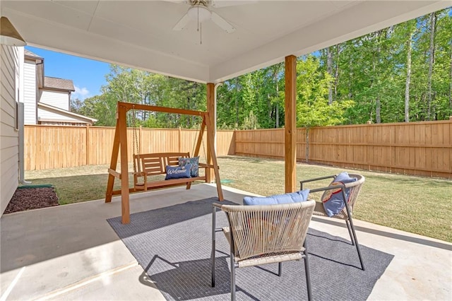 view of patio with ceiling fan and a fenced backyard