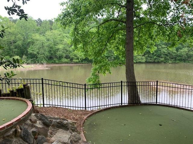 view of patio featuring a water view