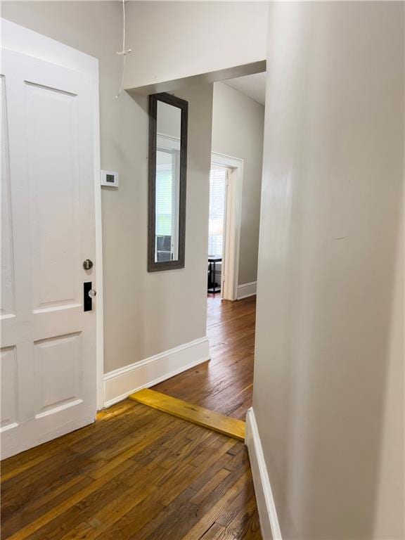 632 Monroe St, Macon, GA 31201 - entryway featuring dark wood-style floors and baseboards