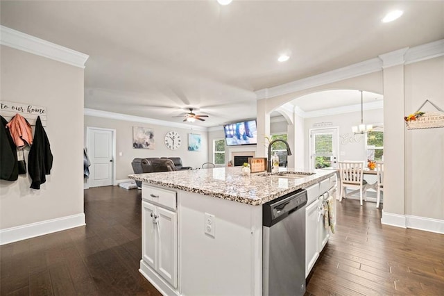 kitchen with white cabinets, dishwasher, sink, and dark wood-type flooring