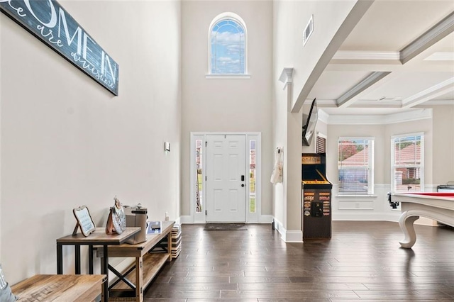 entrance foyer with beam ceiling, dark hardwood / wood-style flooring, coffered ceiling, and billiards